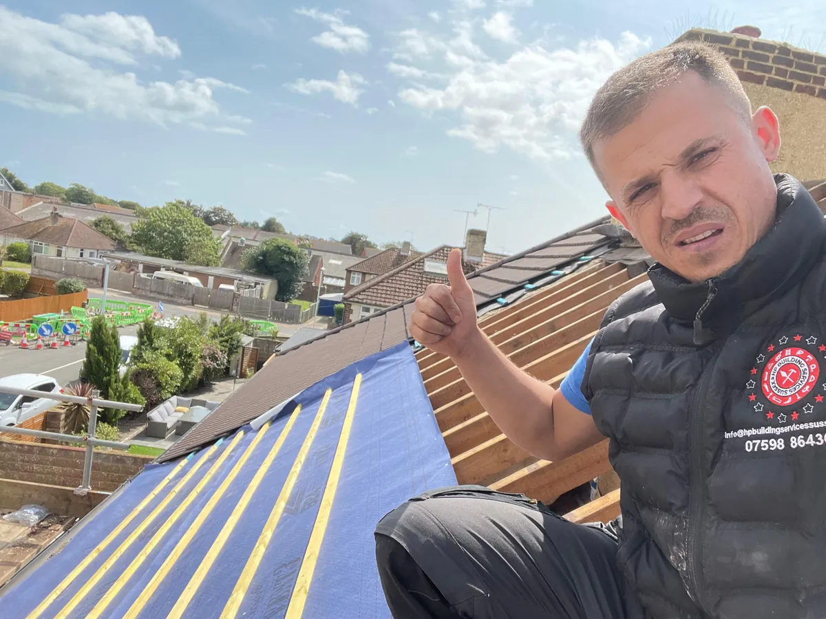 HP Building Services Sussex team member on site